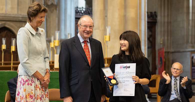 Sunkyung Noh is presented with the Interpretation Gold Medal and certificate by The Countess of Verulam and Derek Bird, of the Williams Church Music Trust